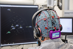 Air traffic controller with EEG hood